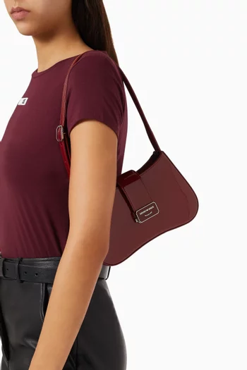 حقيبة كتف هوبو جلد صناعي لامع