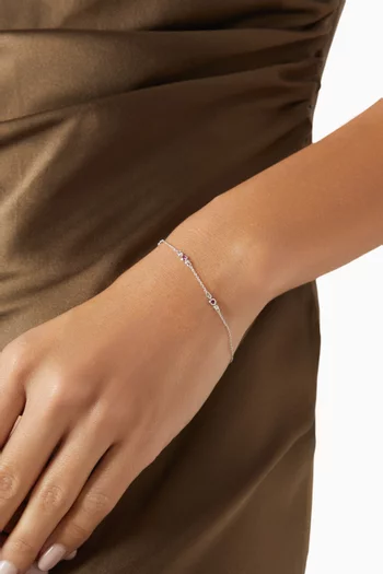 سوار مزين بأحجار مستديرة باللون الأحمر والماس ذهب أبيض عيار 18