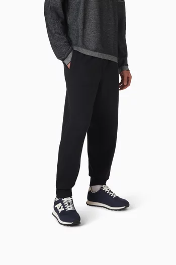 سنيكرز دروب بشعار الماركة على الجانب قماش شبكي