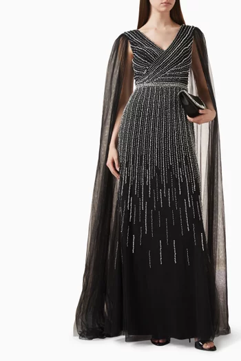 فستان سهرة بتصميم متقاطع وتطريزات بالخرز