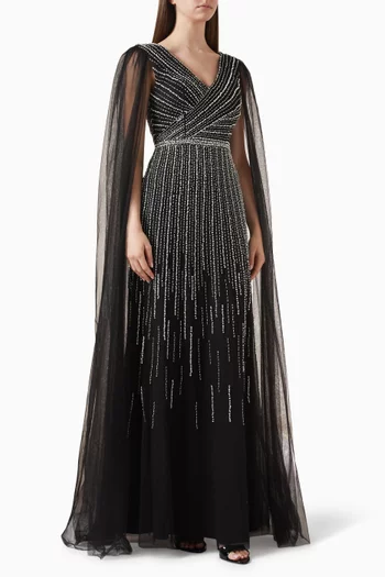 فستان سهرة بتصميم متقاطع وتطريزات بالخرز