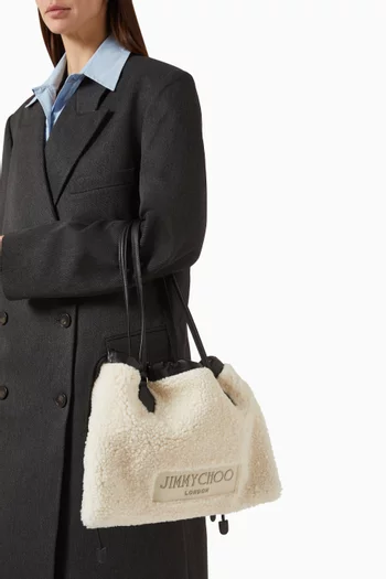 حقيبة يد كبيرة برباط تضييق فرو وجلد