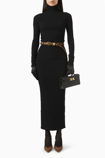 بلوزة بياقة عالية نسيج مضلع