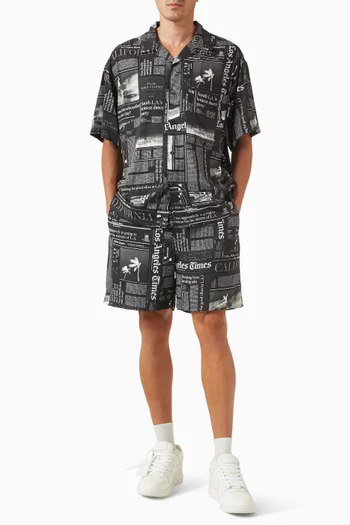 Newspaper-print Bermuda Shorts