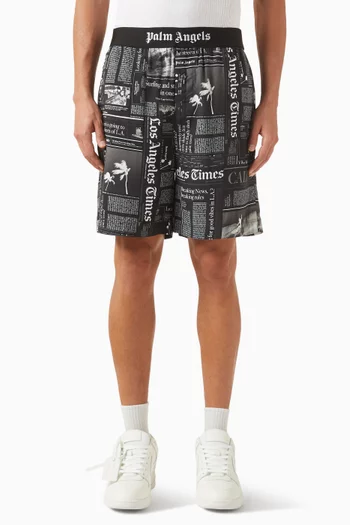 Newspaper-print Bermuda Shorts