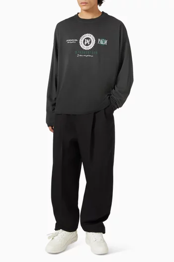 تي شيرت بقصة فضفاضة وطبعة دولار قطن