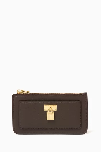 محفظة بسحّاب وقفل جلد حبيبي