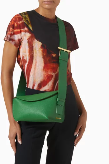 حقيبة سلينغ بحلية على شكل حرف T جلد عجل