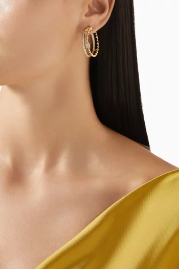 أقراط تريولوجي فوريفر دائرية مرصعة بالماس ذهب عيار 18