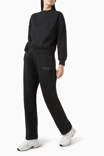 بنطال رياضي بقصة فضفاضة وشعار الماركة