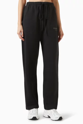 بنطال رياضي بقصة فضفاضة وشعار الماركة