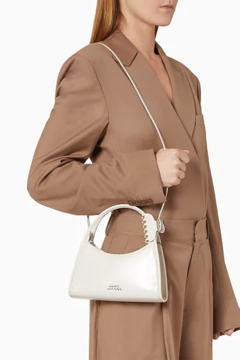 The Glam Claw Clip Crossbody Bag in Leather