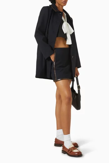 تنورة مازارين قصيرة بأشرطة من الجلد