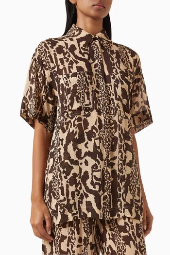 قميص جولدي بنقشة جلد حيوانات جورجيت شبه شفاف