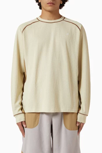 تي شيرت بأكمام طويلة وتقنية Dri-FIT ADV من مجموعة ايه سي جي