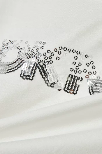 تي شيرت بشعار الماركة مطرز بالترتر جيرسيه