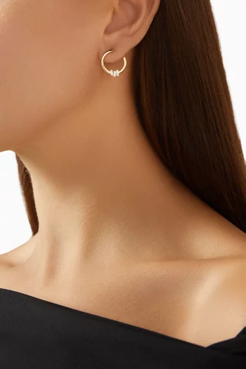 أقراط دائرية تايملس مرصعة بماسات مستطيلة ذهب عيار 18