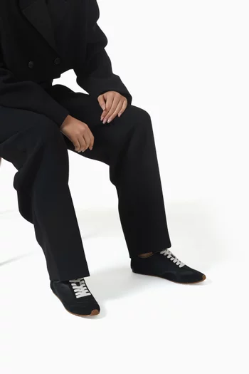 سنيكرز للجري بشعار كوتش شمواه وستان