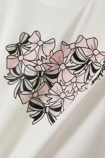 تي شيرت بطبعة قلب وعُقد قطن