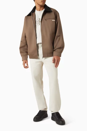 بنطال جينز بقصة تضيق باتجاه الحافة مستوحى من التسعينيات دينم