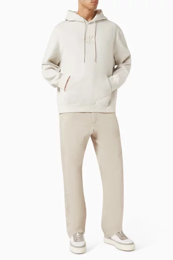 كنزة بغطاء رأس بقصة فضفاضة ورقعة شعار الماركة صوف