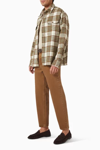 بنطال جينز بقصة قصة ساق تضيق نحو الحافة دينم