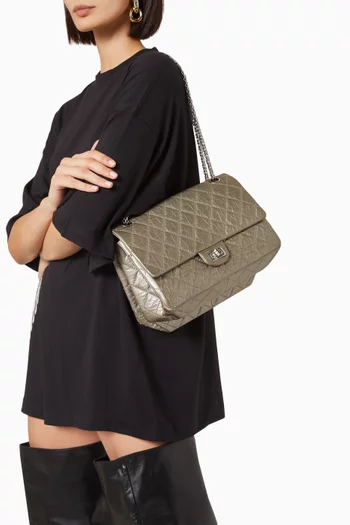 حقيبة ريإيشو بغطاء قلاب وثلاثة أقسام داخلية جلد لامع مبطن 