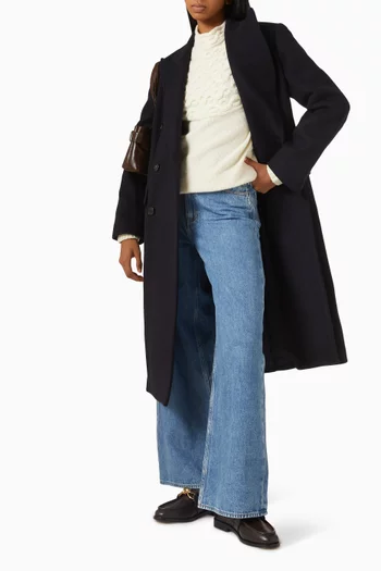 سترة بجزء منسوج بغرزة الضفيرة أسفل الرقبة