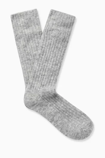 جوارب مطرزة بشعار الماركة نسيج مضلع