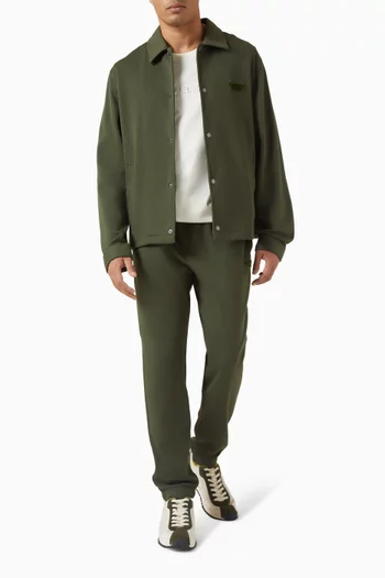 تي شيرت بشعار الماركة بملمس بارز قطن