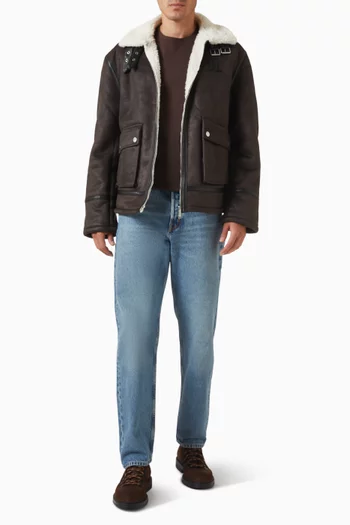 جاكيت فرو بأحرف الماركة شمواه صناعي