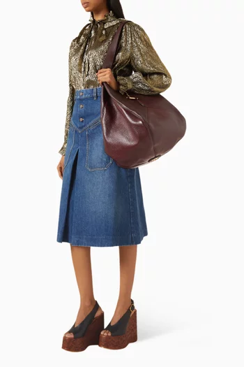 حقيبة بالون متوسطة جلد حُبيبي وجلد شمواه