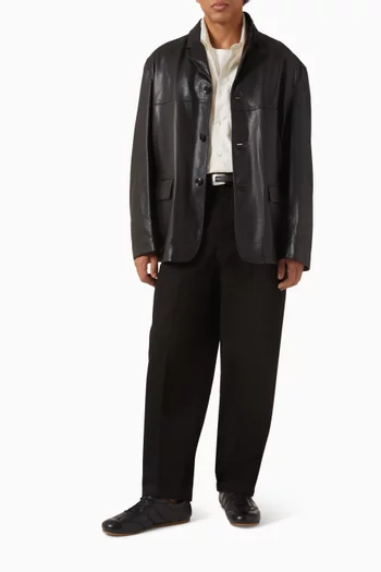 جاكيت بصف أزرار جلد