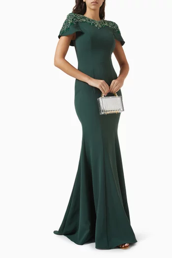 فستان سهرة بتصميم حورية بحر مطرز بالخرز