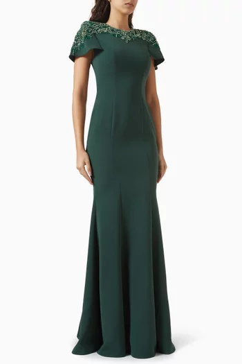 فستان سهرة بتصميم حورية بحر مطرز بالخرز