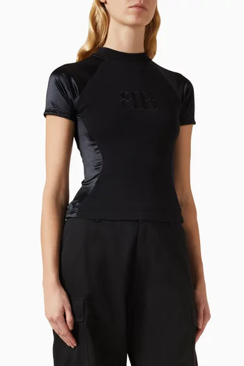 بلوزة بقصة ضيقة بشعار حرفي BB نانو جيرسيه