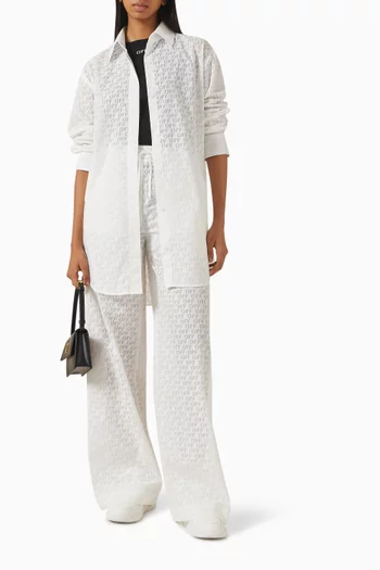 قميص طويل بشعار الماركة