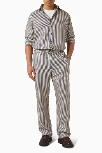 بنطال غابريل بقصة ساق واسعة ونقشة مخططة