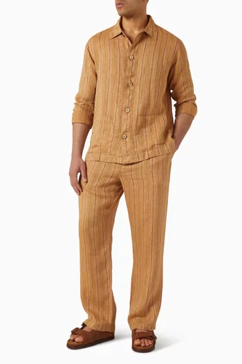 بنطال غابريل بقصة ساق واسعة ونقشة مخططة