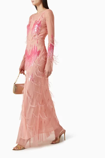 فستان مطرز بالترتر والريش