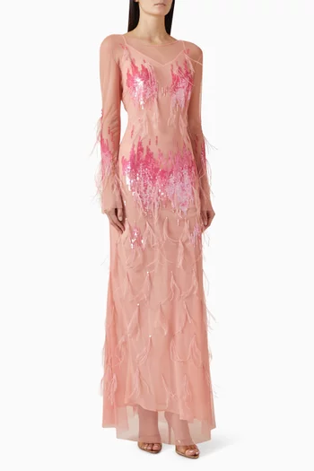 فستان مطرز بالترتر والريش