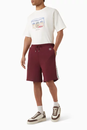 تي شيرت بطبعة قصر وشعار الماركة قطن