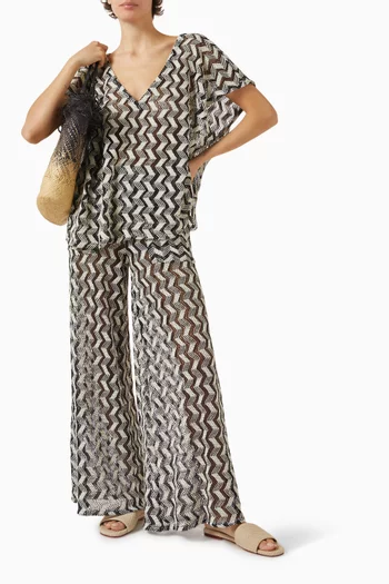 بونشو فارا للارتداء فوق ملابس السباحة بنقشة خطوط متعرجة