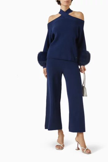 سترة بتفاصيل متقاطعة وحافة مزينة بالفرو صوف وكشمير