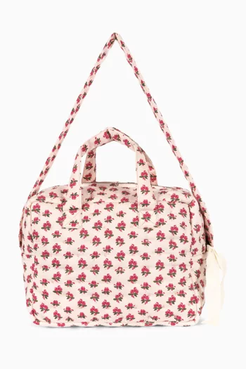 حقيبة مستلزمات دمى بنقشة زهور 