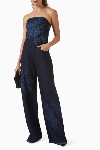 بنطال جينز بقصة بويفريند وتطريز زهور دينم