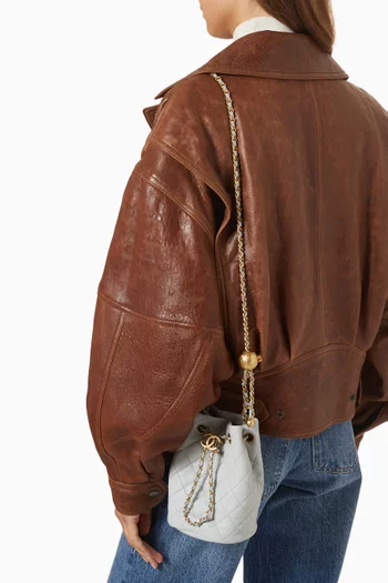 حقيبة باكيت بيرل كراش مبطنة برباط تضييق جلد