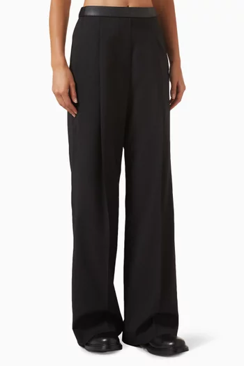 بنطال بقصة ساق واسعة جلد