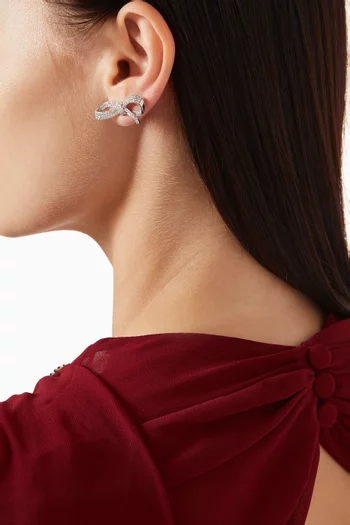 أقراط بتصميم عقدة مرصعة بكريستال بافيه نحاس مطلي روديوم