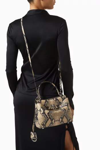 حقيبة يد روديو ميني جلد عجل بنقشة جلد الأفعى